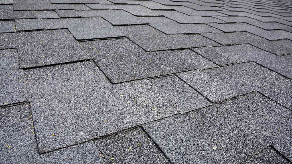 Up-close image of dark gray shingles, installed in Livingston, NJ by expert roofers.