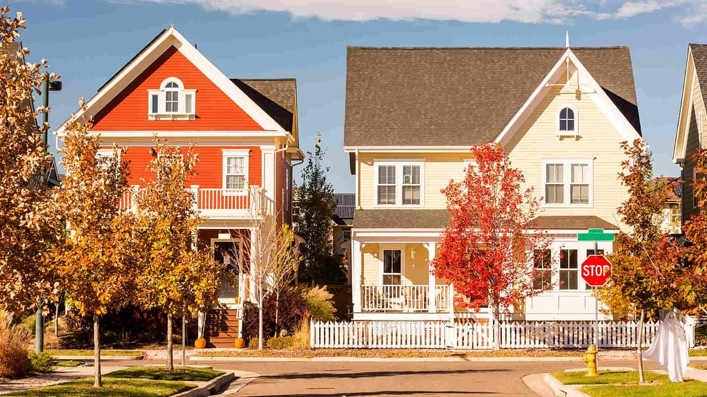 Image of two houses during fall season