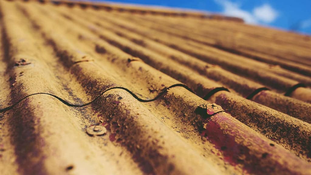 old stained and rusted roof for roof repair madison nj