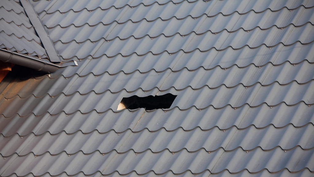 Hole in a metal roof